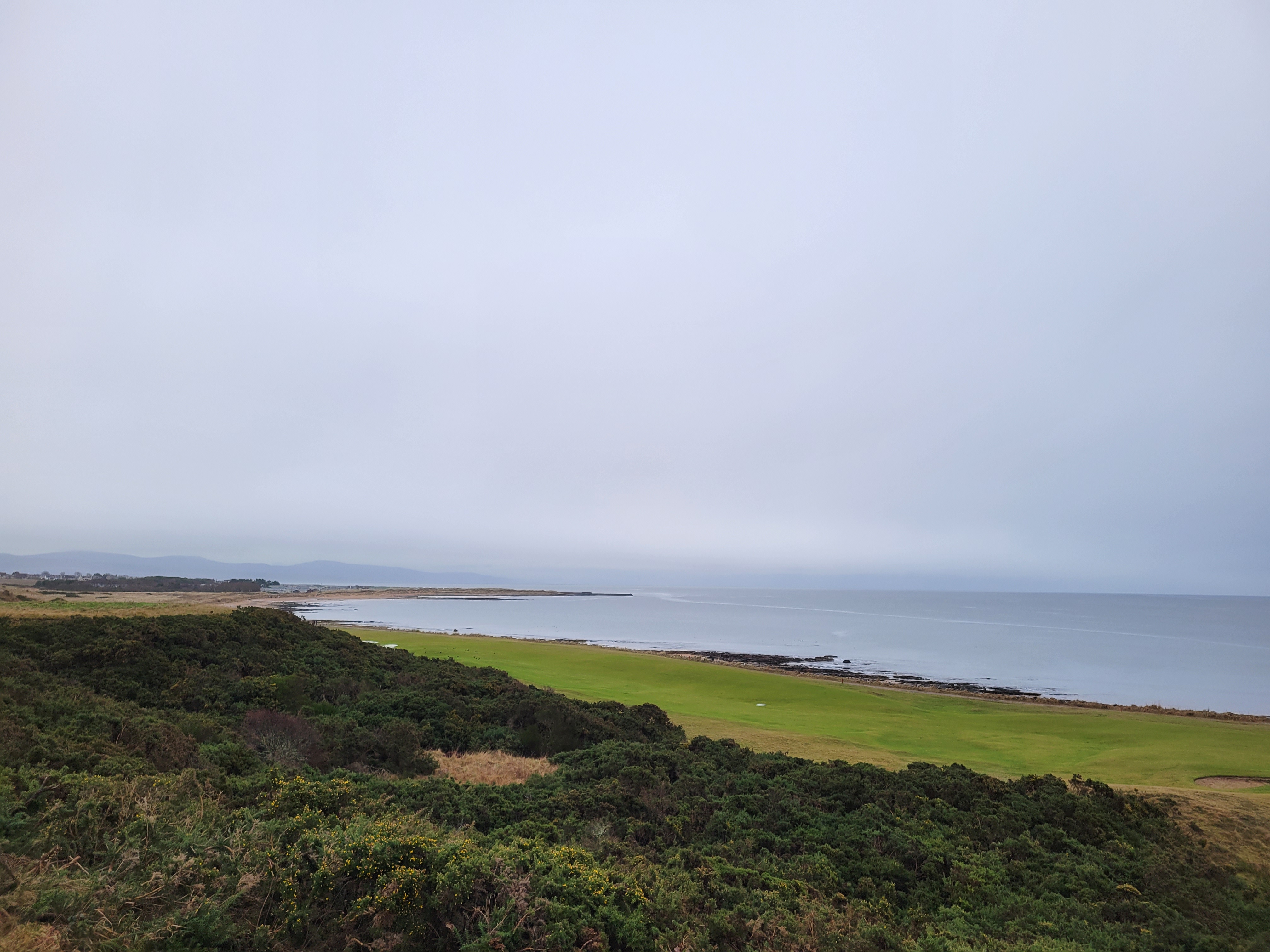 View over the north sea towards Embo pier from Dornoch golf course 